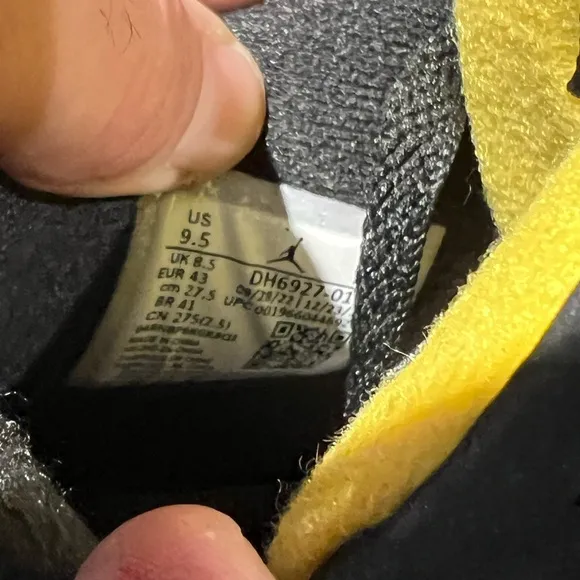 Air Jordan 4 Retro Black and Yellow Thunder Sneakers