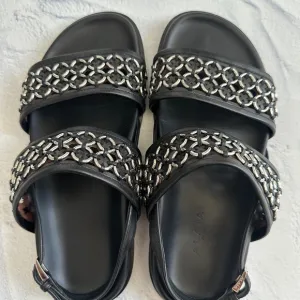 ALAÏA Eyelet Slingback Sandals