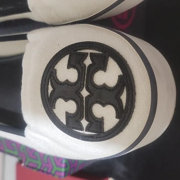 Authentic Tory Burch ivory and navy sneakers
