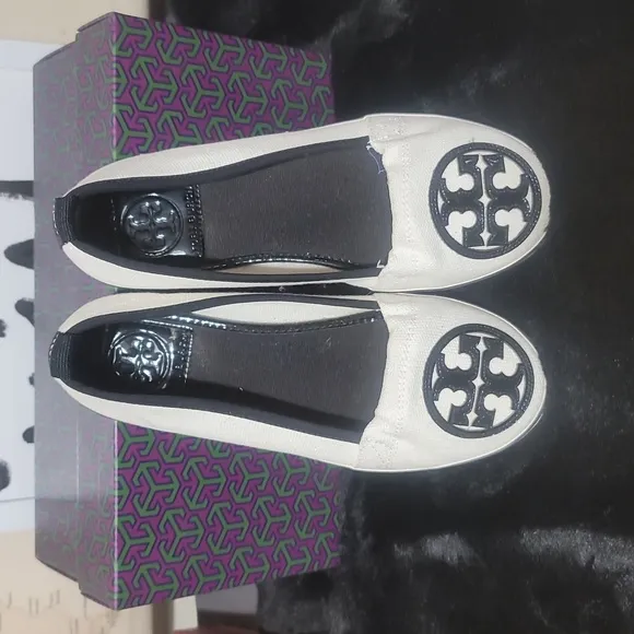 Authentic Tory Burch ivory and navy sneakers