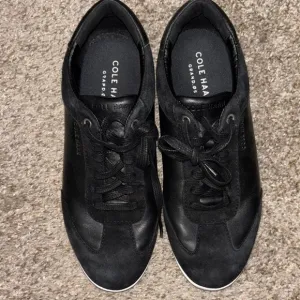 Cole Haan Black Low-Top Athletic Shoes with Sleek Design