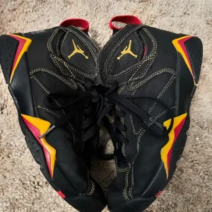 Jordan Black and Red Sneakers with Suede Finish