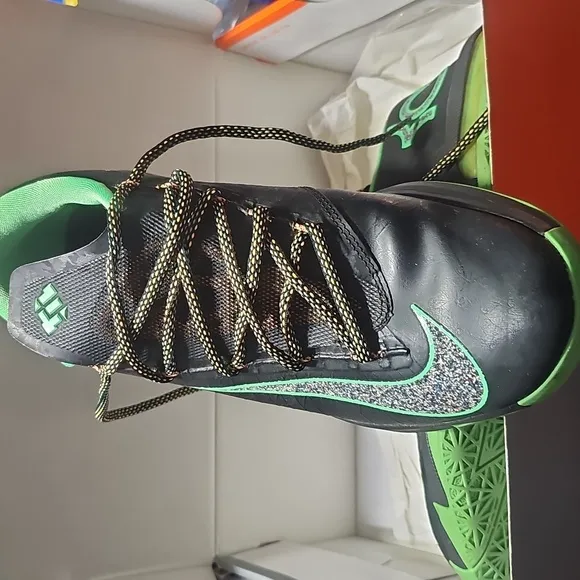 KD. VI  Black and Green Athletic Shoes