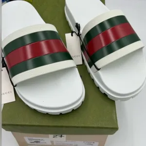 Men's Gucci White Rubber Slide Sole sandals. Size 11