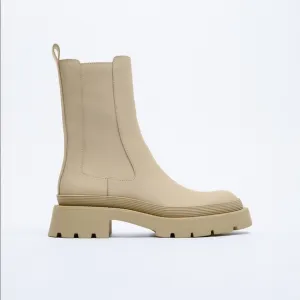 NWT. Zara Cream Rubber Ankle Boots. Size 10.