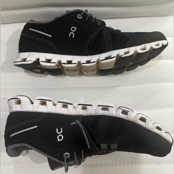 On Running Black Athletic Shoes with Cloud Cushioning
