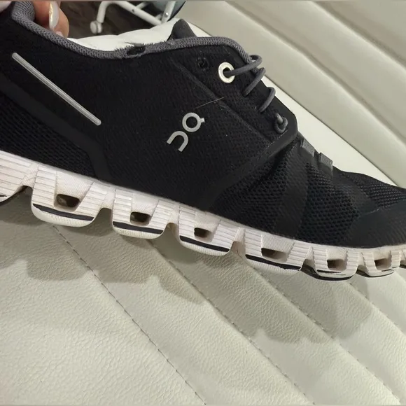On Running Black Athletic Shoes with Cloud Cushioning