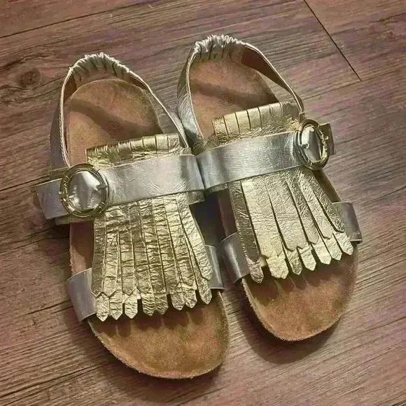 Tory Burch Multi Logo Kiltie Sandals Metallic Gold and Silver Leather