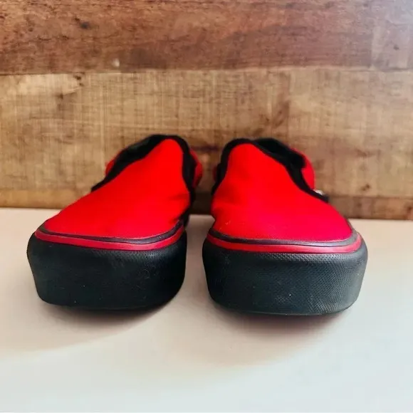 Vans Customized Slip Ons With Smokinhot VaporsWritten On The Back Of The Shoes