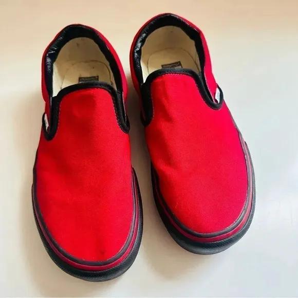 Vans Customized Slip Ons With Smokinhot VaporsWritten On The Back Of The Shoes