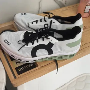 White and Black Athletic Shoes